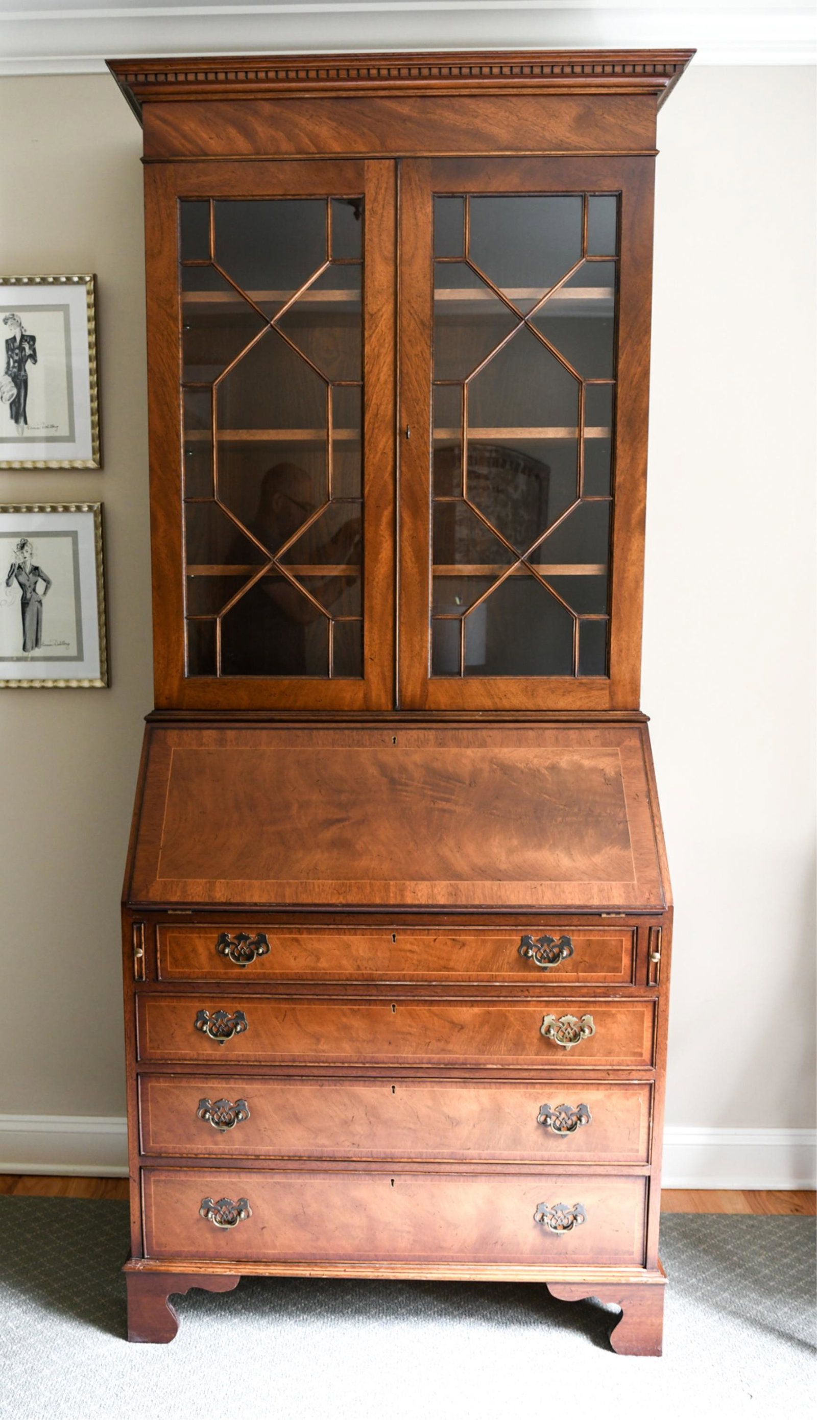 SAFAVIEH SECRETARY CABINET: Dimensions: H 87.5" x W 36.5" x D 20.5" Condition: Signs of use including wear to edges, surface scratches. *Interior contents not included.*