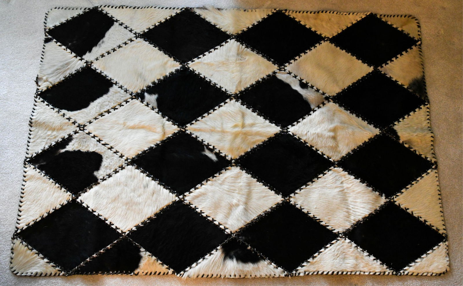 PATCHWORK COW HIDE RUG (1 of 4)