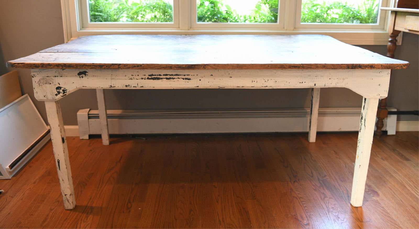COUNTRY STYLE DINING TABLE: Dimensions: H 29" x W 67.5" x D 41" Condition: Loose legs needing some repair, Some splits to wood, separation of boards to top. Paint loss. Wear consistent with age and use.