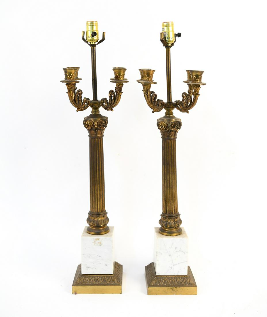 PAIR OF CANDELABRA MARBLE BASE LAMPS: Dimensions: (Top of light socket) H 30" x W 7.5" x D 7" Condition: Untested. Wear consistent with age and use including overall patina to metal. Cracks to metal at bottom of column on one lamp. Soilin