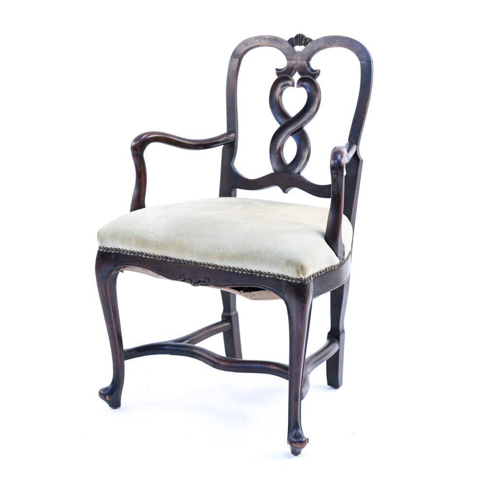 FRENCH STYLE CARVED WOODEN ARMCHAIR: Dimensions: H 35" x W 22.5" x D 17.25" x SH 18" Condition: Wear consistent with age and use including joint separation with previous repairs. Some scratches, nicks, scuffs and areas of finish loss to 