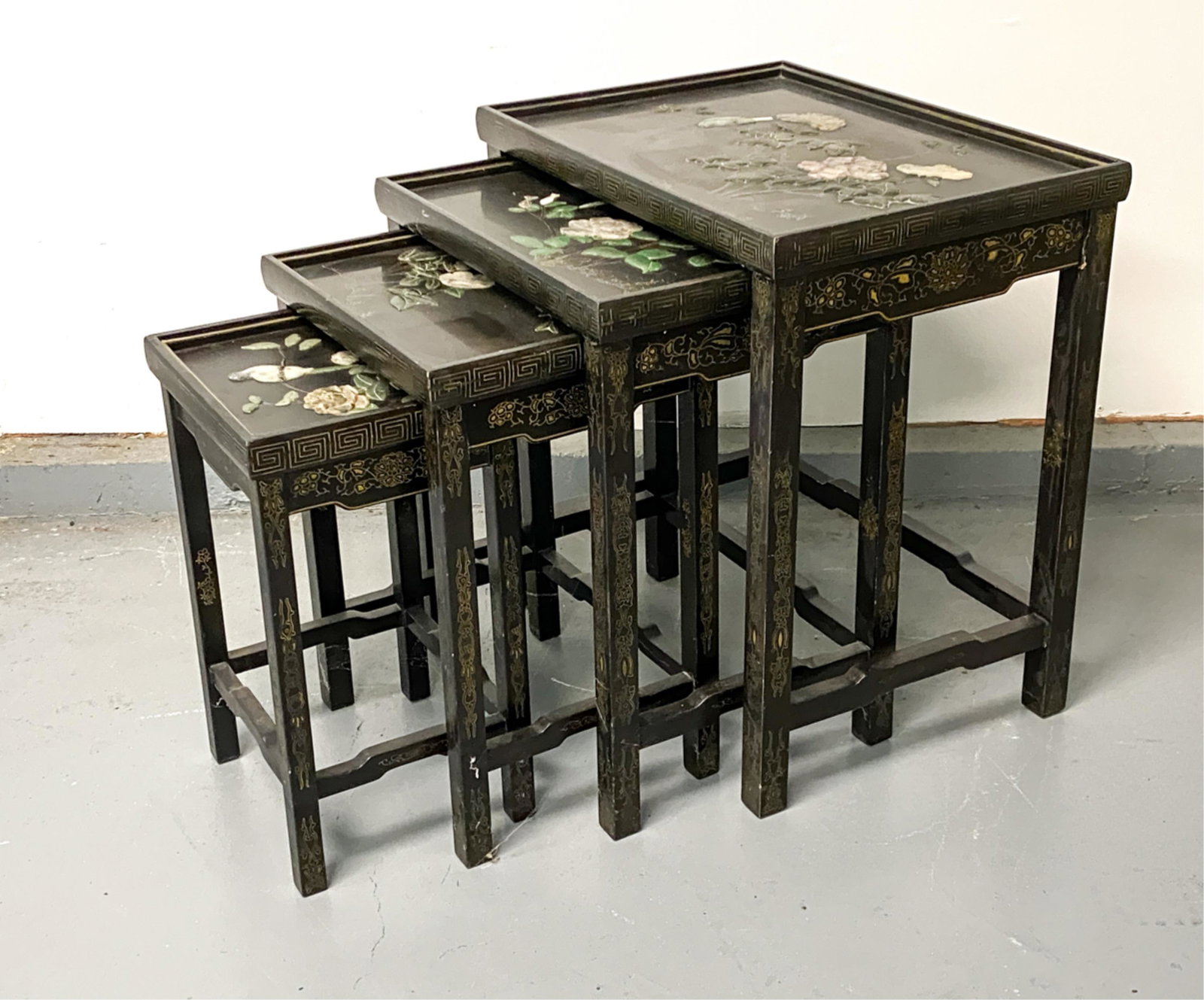 CHINESE INLAID NESTING TABLES: Dimensions: (Largest) H 24" x W 22" x D 16" Condition: Showing signs of wear including sun fading, scratches and dings to finish.