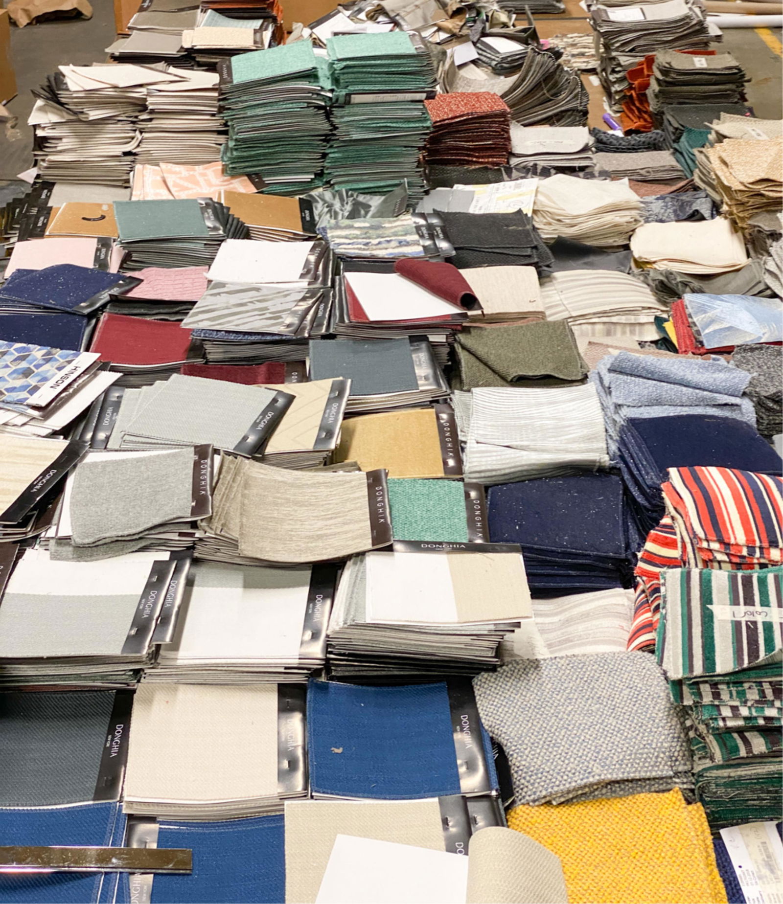 LARGE GROUPING OF FABRIC SWATCH SAMPLES: Including Donghia, Rubelli, Sahco, Armani Casa, etc. Condition: As found.