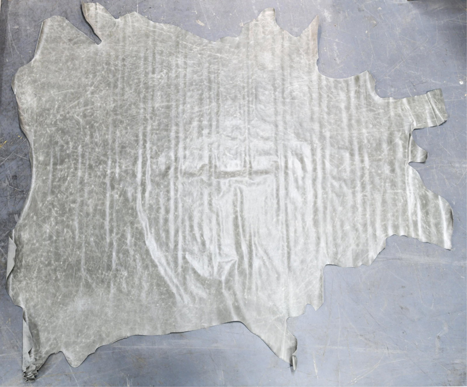 ITALIAN LEATHER HIDE FOR UPHOLSTERY GROUPING: (6) rolls of Pearl. Condition: As found.