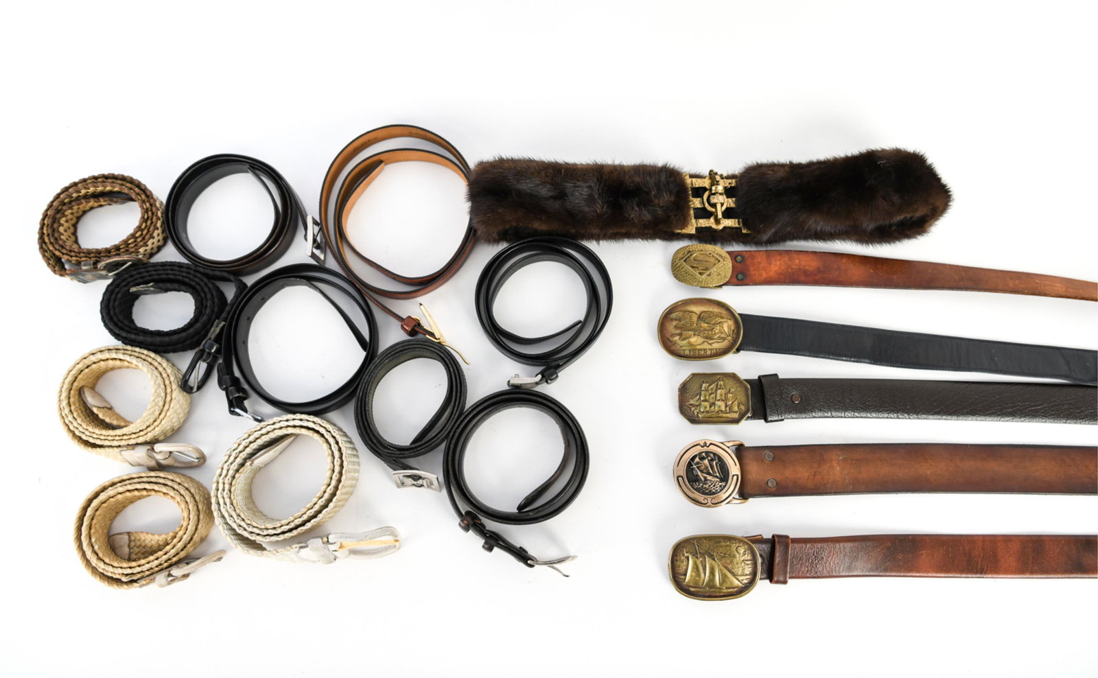 DESIGNER BELT GROUPING: Including artist made buckles by James Breakell. and exceptional mid-Century fur belt with sculptural brutalist buckle belt. French hand-braided belts. French leather belts, Saks Fifth Ave, Christian 