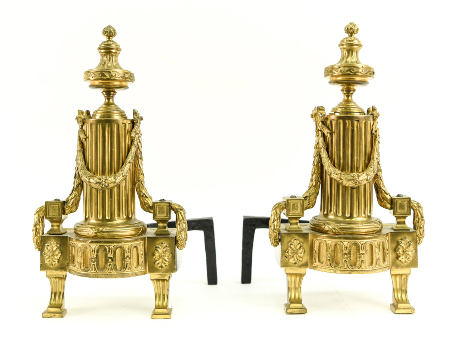 PAIR OF EMPIRE STYLE CHENETS: Polished brass. Dimensions: H 15" x W 9" x D 8" Condition: Some surface wear. Scratches around the edges.