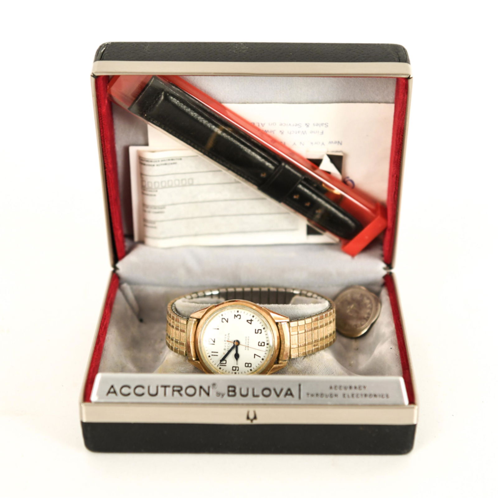 BULOVA ACCUTRON GOLD FILLED WATCH: 10k gold filled bezel. In Bulova box. Dimensions: (Box) H 2" x W 5.25" x D 4.25" Condition: Not tested. Scratches to glass. Showing signs of use.