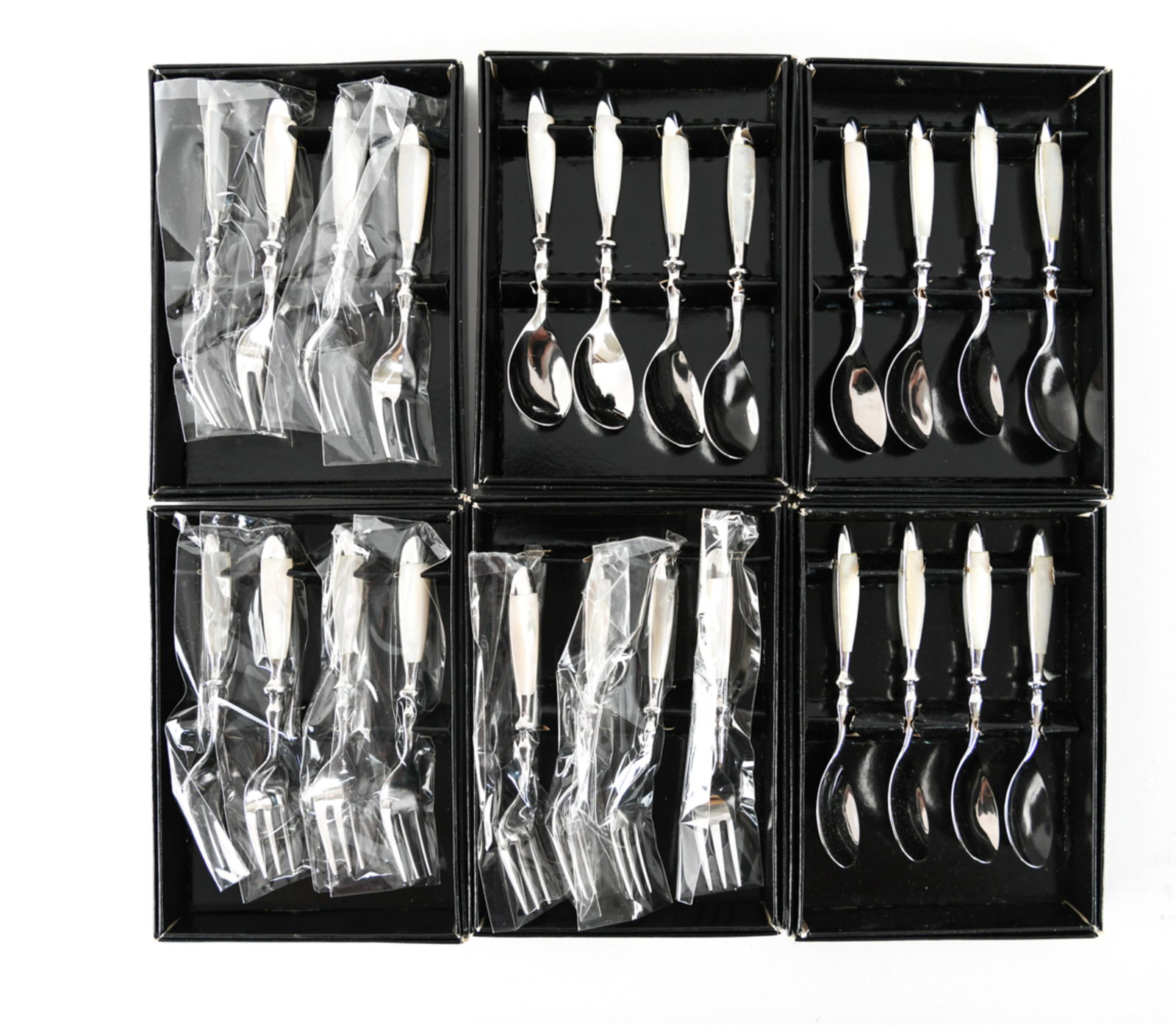 GROUPING OF MOTHER OF PEARL HANDLE FLATWARE: In original boxes. (12) spoons and (12) forks. Dimensions: (Fork) L 4.75" Condition: Mostly new in boxes, some lightly used.
