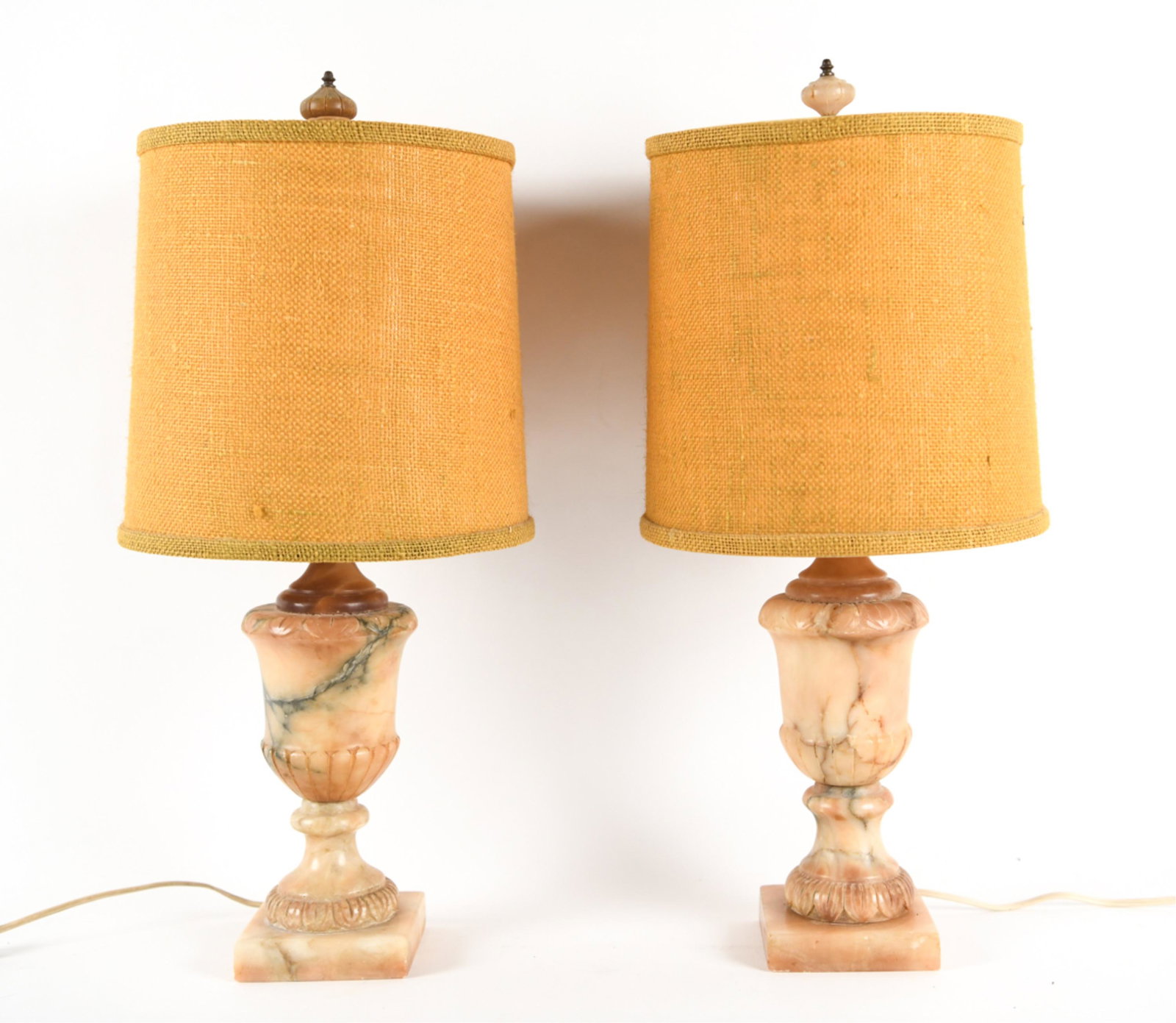 PAIR OF ALABASTER LAMPS: Twine shades. Alabaster finials. Dimensions: (Incl. shade) H 23" x Dia. 10" Condition: One finial possibly replaced. Some small chips and scratches to alabaster.