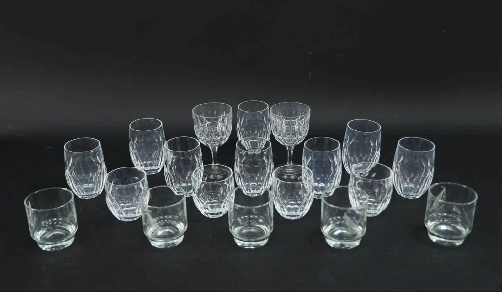 GROUPING OF WATERFORD CRYSTAL GLASSES: Fine Waterford Crystal grouping. 8 water glasses. 4 tumblers. 2 unmarked wine glasses. Dimensions: (Wine) H 6.25" x 3.5" Condition: Minor surface wear and scratches.