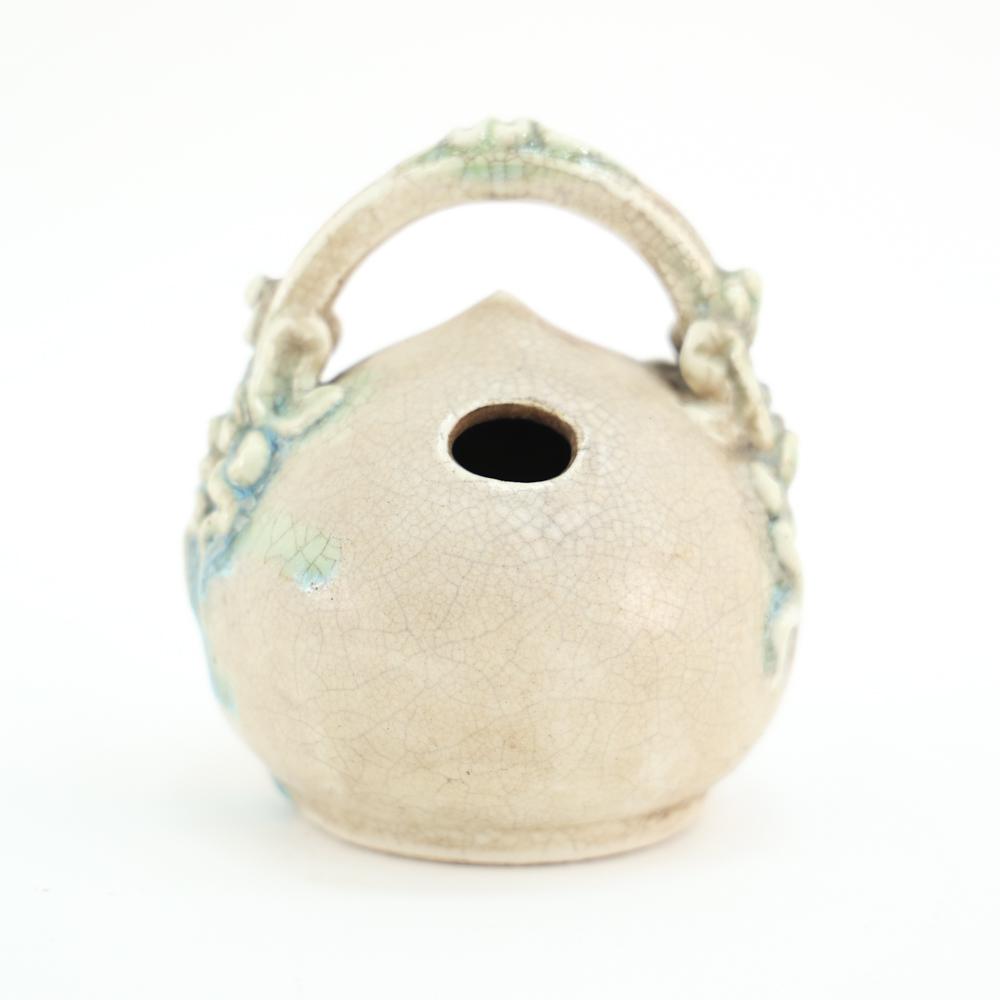 VIETNAMESE LIME POT: Unsigned. Dimensions: H 4.5" x W 4.25" x D 4" Condition: Crazed glaze and handling wear.
