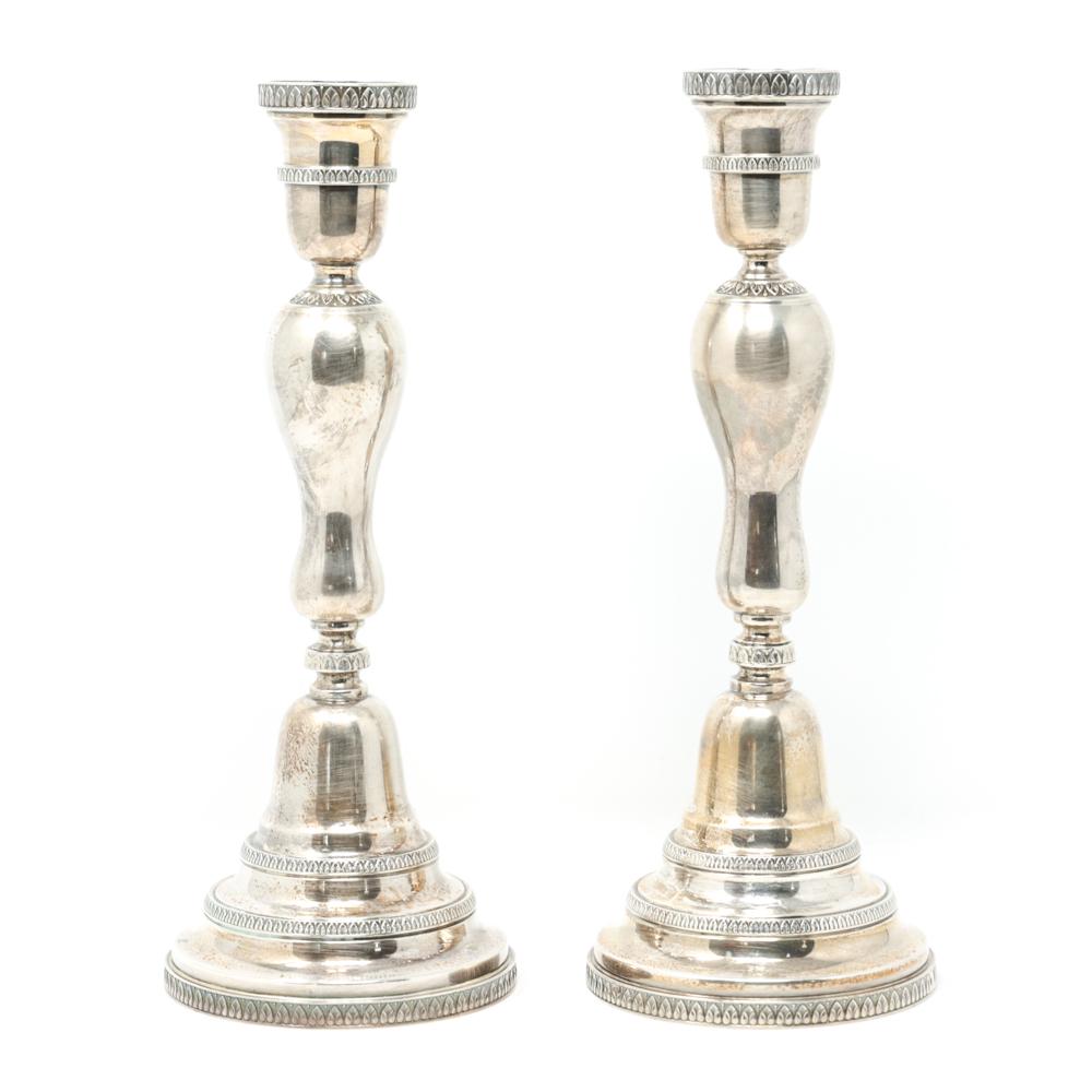 GIANMARIA BUCCELLATI STERLING SILVER CANDLESTICKS: Marked underneath: Gianmaria Buccellati, Italy, 925. Dimensions: H 10.75" x Dia. 4.25" Weight: 28.335 ozt Condition: Some tarnish, surface scratches. One slightly bent. Note: We are offering in-house
