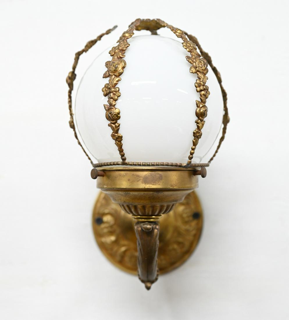 ANTIQUE GLASS GLOBE W/ ORMOLU SCONCE: Dimensions: H 14" x W 7" x D 12" Condition: Patina to brass with break to top of one ormolu connection.