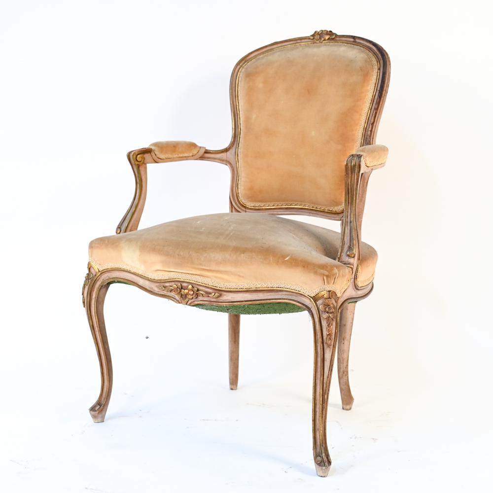 FRENCH LOUIS XV STYLE VELVET UPHOLSTERED ARMCHAIR: Dimensions: H 36" x W 24" x D 24" S.H.19" Condition: Showing signs of wear including soiling to upholstery, losses, scratches and stains to wood finish. Loss to carved top of backrest. some joint sepa