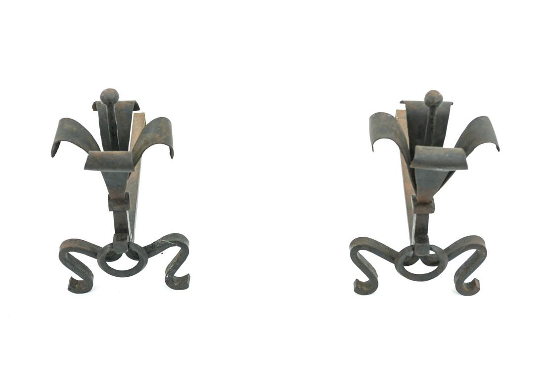 ARTS AND CRAFTS ANDIRIONS: Dimensions: H 17" x W 10" x D 24" Condition: Showing signs of use including slight surface rust.