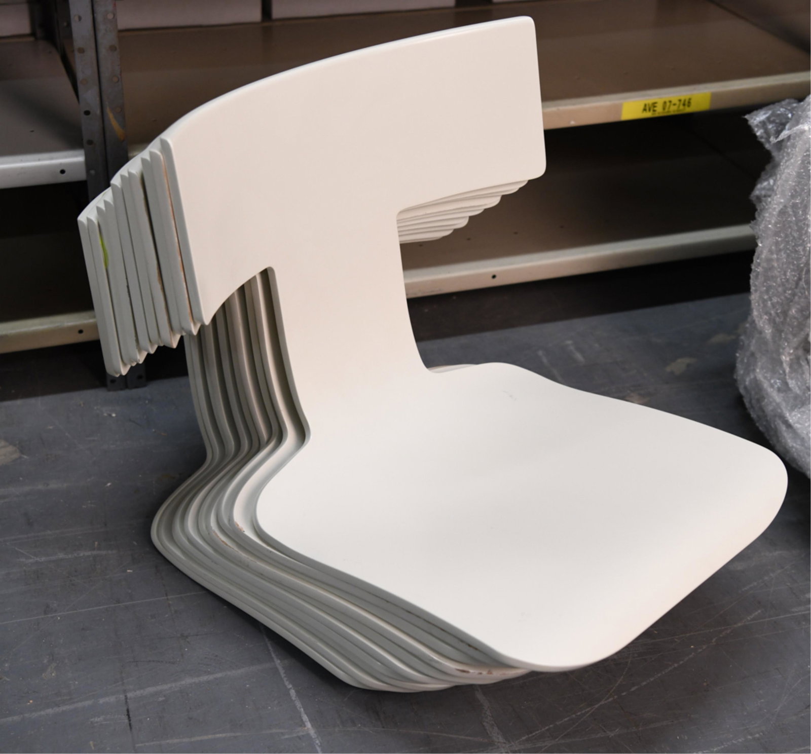 (10) DONGHIA ANZIANO CHAIR SEATS: A bentwood klismos silhouette. Color, ivory lacquer. Dimensions: (Each) H 16.5" x W 17" x D 20" Condition: Showing some signs of use including a few surface marks. Wear to some edges including small l