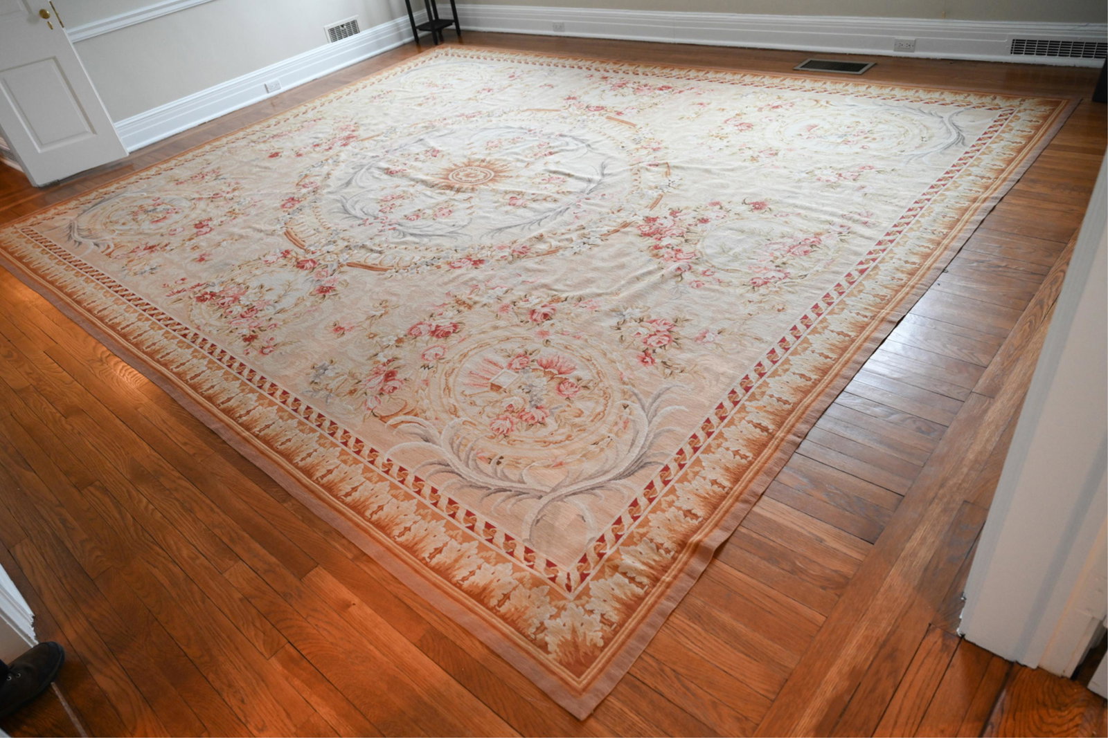 MODERN AUBUSSON STYLE NEEDLEWORK RUG: Subtle coloring with swags and cartouche design. Large room size. Dimensions: L 15' x W 142" Condition: Light age wear. Possible light fading.