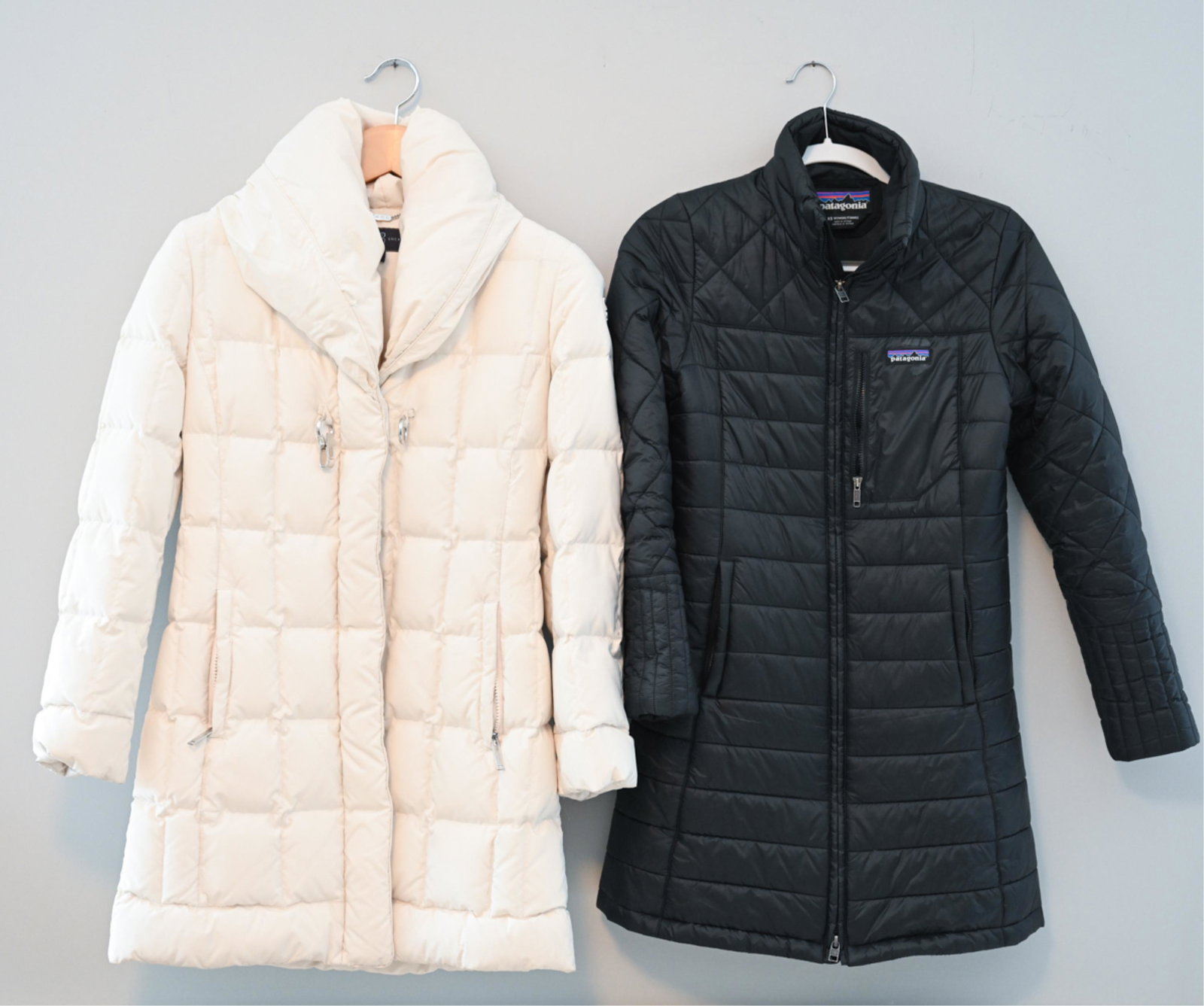GROUPING OF (2) WOMEN'S DOWN COATS: Including Patagonia, size XS; and Happy Lucky "Madison" white quilted mid-length coat, size small. Condition: Used, small areas of soiling to neck and sleeves.