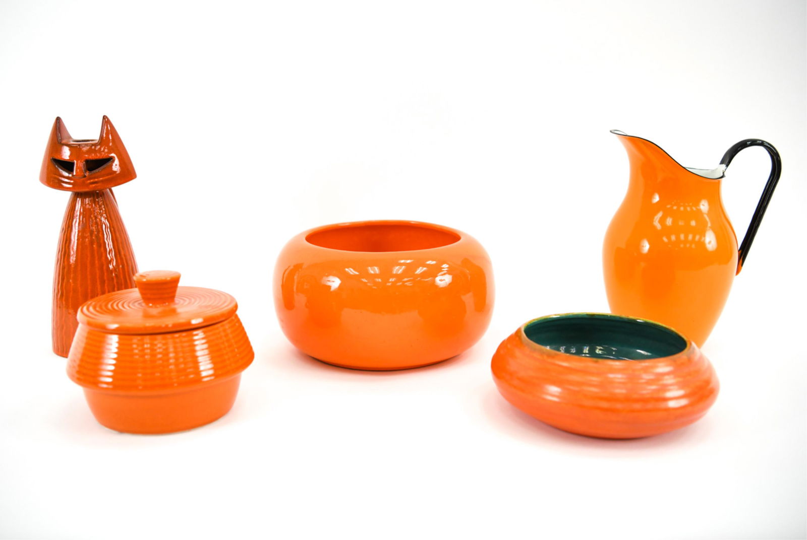 MID-CENTURY CERAMIC GROUPING INCL. ROYAL HAEGER: Grouping of (5) pieces decorative tangerine serveware, including: Royal Haeger 350 red-orange ceramic cat candle holder c.1960s; California pottery round covered dish marked "Calif USA R150"; studio c