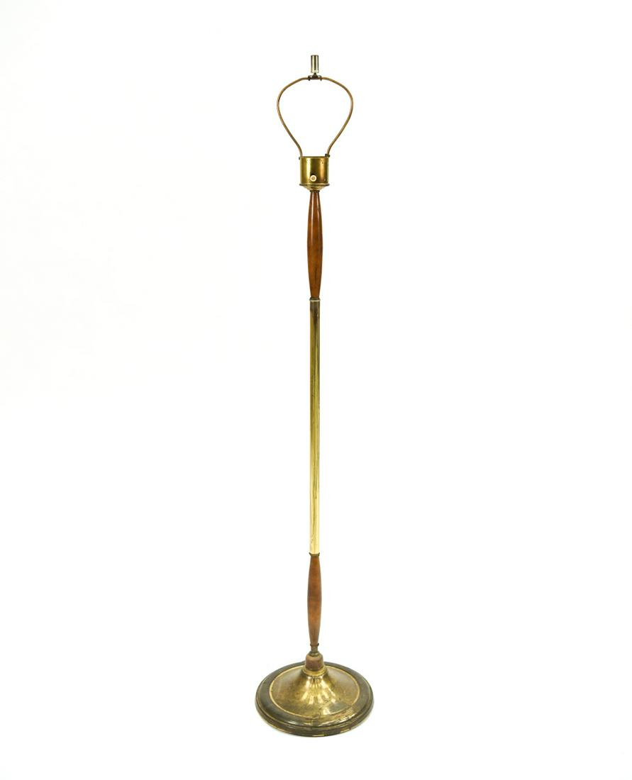 MANNER OF GERALD THURSTON BRASS & WOOD FLOOR LAMP: Minimalist design, with polished brass and turned wood (likely walnut or teak). Dimensions: H 58" x D 11.5" Condition: Finish wear and oxidation consistent with age and use.