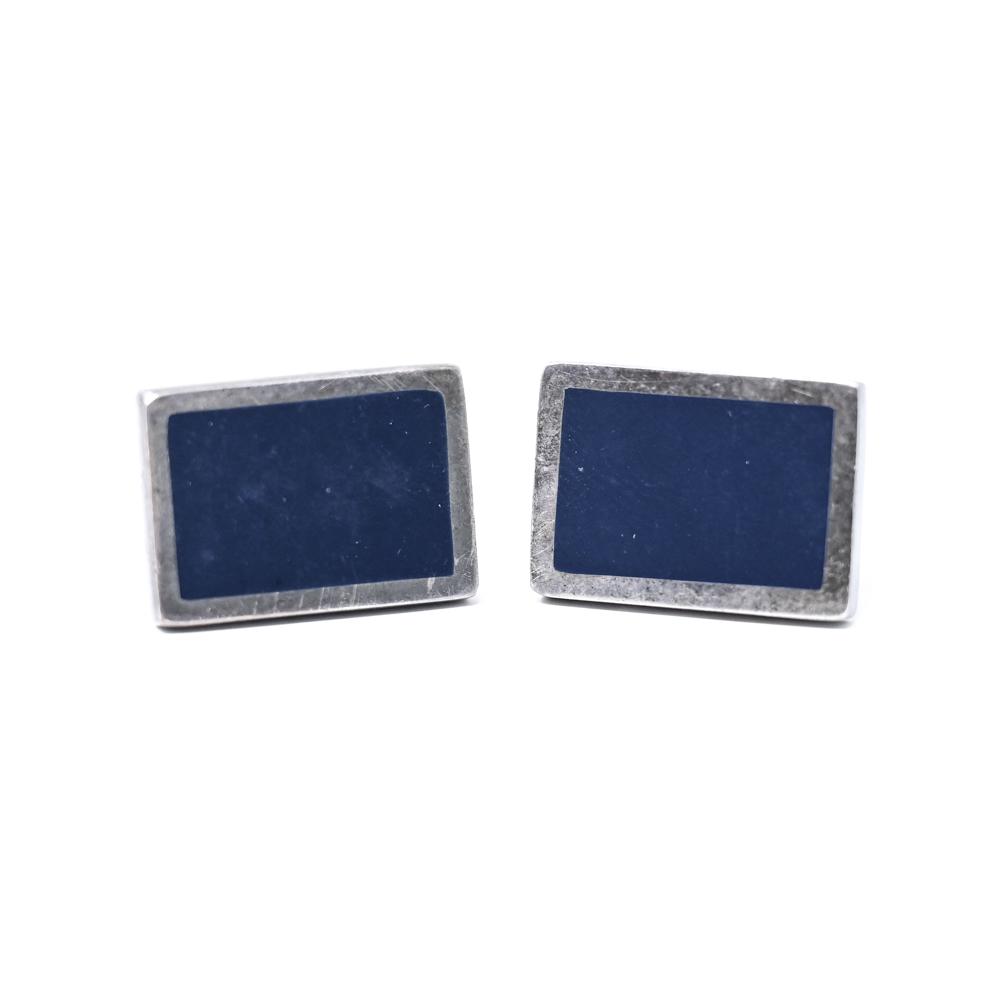 GUCCI STERLING SIVER & ENAMEL CUFFLINKS: Dark blue enameling with sterling silver. Dimensions: Face: L 0.75" x W 0.50" Weight: 0.50 ozt Condition: Minor surface scratching.