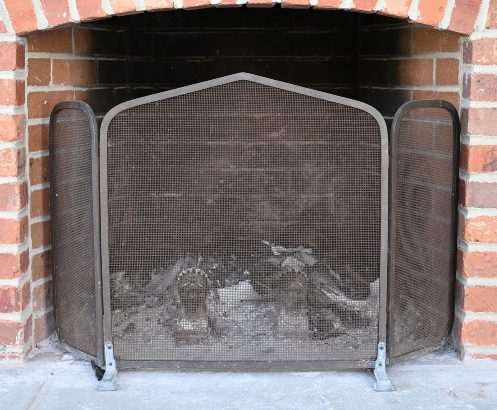 FIRE SCREEN AND ANDIRONS: Dimensions: (Screen as pictured) H 23" x W 33" x D 11.5" Condition: Some losses to andirons and patina to screen. Wear consistent with outdoor fireplace use.