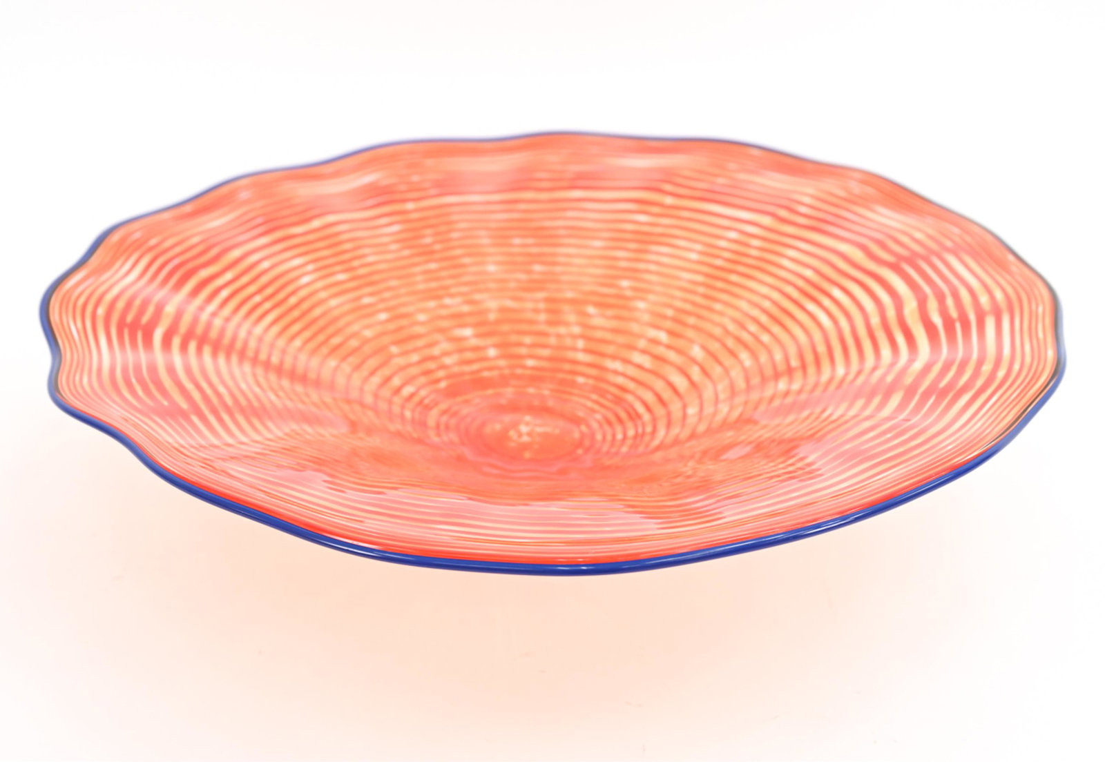 ELLIOT CALVETTI ART GLASS SCULPTURE: Signed underneath near pontil mark. Dimensions: H 6.5" x Dia.20.5 " Condition: Very little wear; a few tiny scratches, a few flea bites to edges.