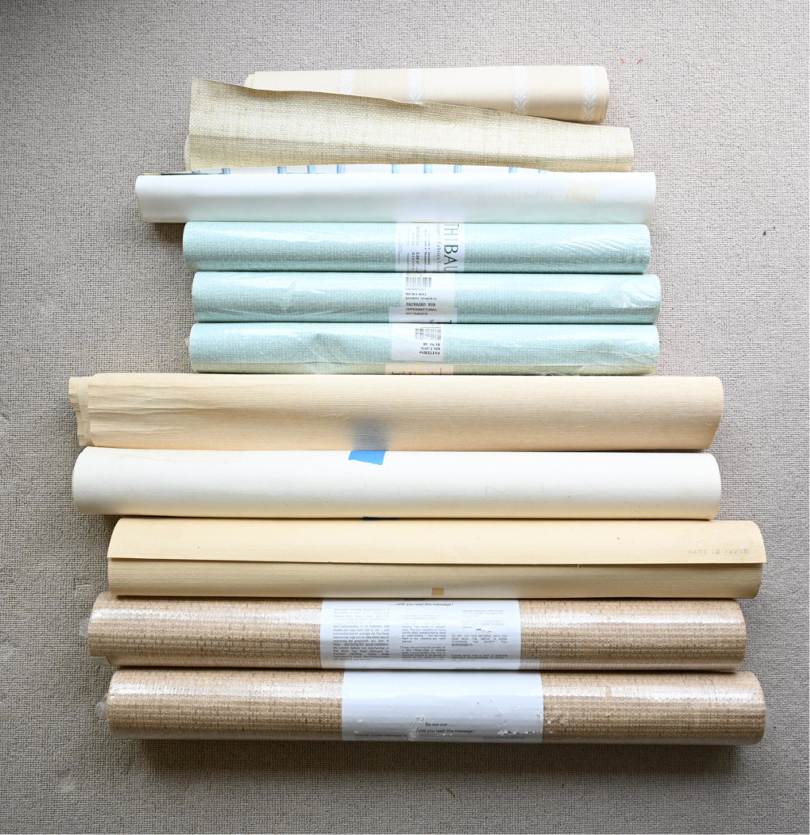 GROUPING OF WALLPAPER: Including (3) rolls of Thibaut, (2) rolls of Estamerika, and (6) rolls of unknown. Thibaut is pattern #839-T-1973 Run #8 with 60.75 sq ft each bolt (9 ft x 27"). Estamerika is pattern no. 520182 with 