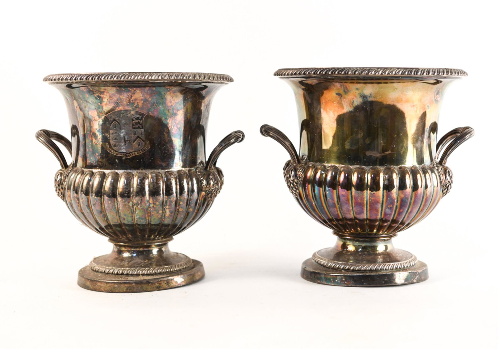 PAIR OF SILVERPLATE SHEFFIELD STYLE WINE COOLERS: Dimensions: H 9.5" x W 10" x D 8.25" Condition: Tarnish to surface with scratches and inner oxidation.