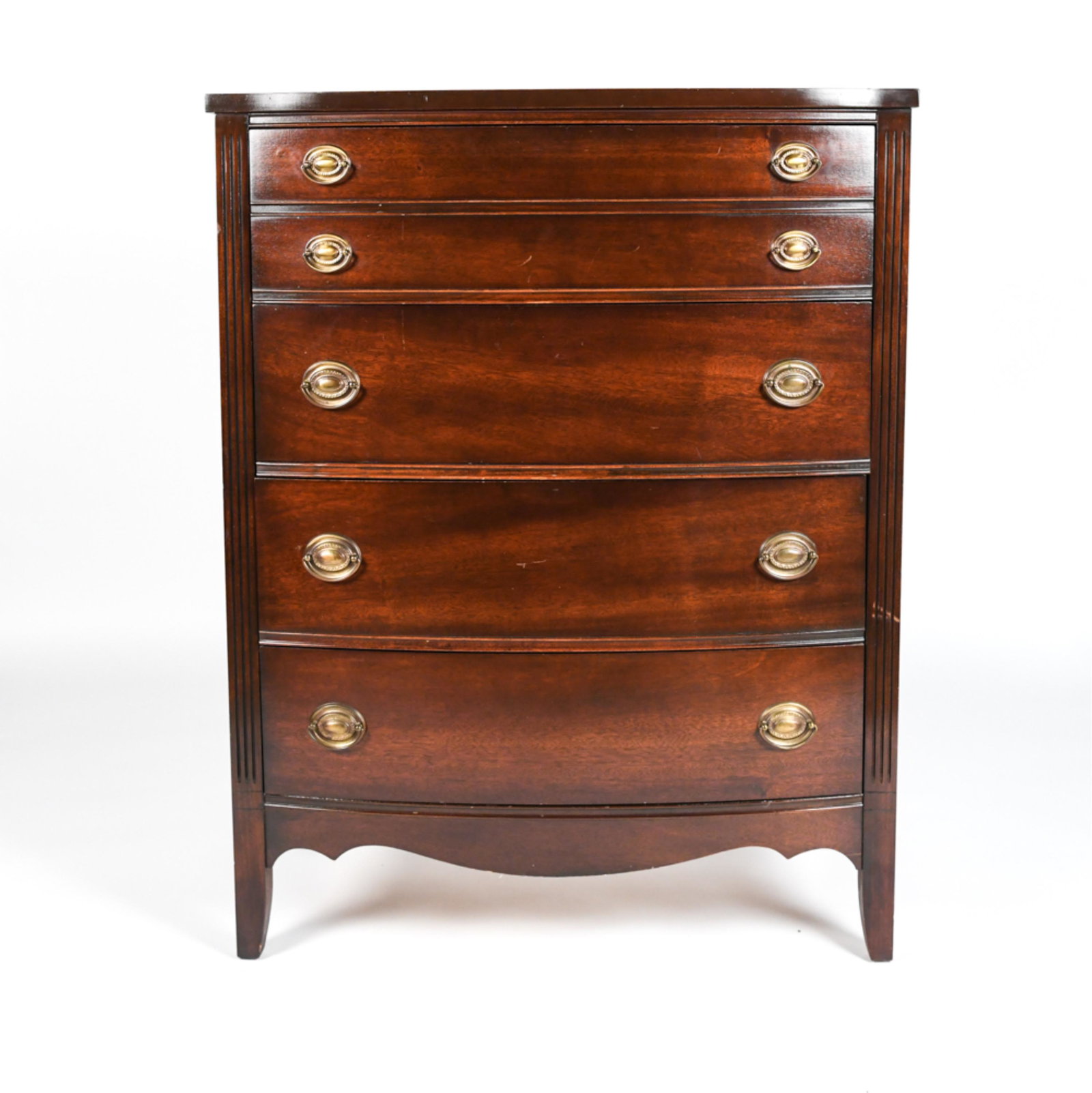 4 DRAWER TALL DRESSER: Dixie Furniture wooden 4 drawer dresser with brass pulls. Dimensions: H 46.5" x W 36" x D 19.5" Condition: Patina to drawer pulls. Scratches and scuffs to top. Rubbing and chips to edges.