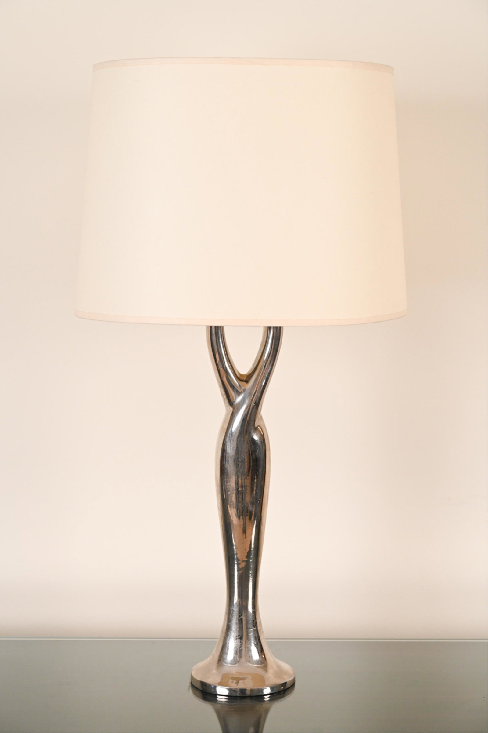 HOLLY HUNT "MARGARET" LAMP: Silver metal finish, paper shade. Two sockets. Originally purchased for $5,600.02. Dimensions: (Overall) H 30" x W 16" x D 13" Condition: Minor oxidation to lamp body. Good, working order. Good overal