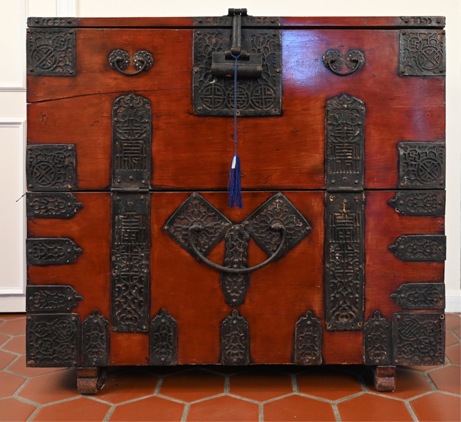 KOREAN BANDAJI CHEST: Pine wood. With 1975 reciept from The Store from Tong-In. Dimensions: H 34.5" x W 38" x D 18" Condition: Some peeling to metal appliques. Natural splits to wood. Losses and scuffs to bottom.