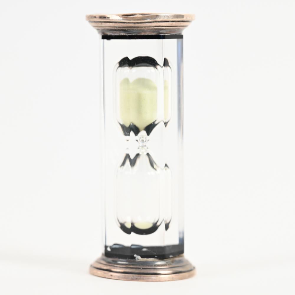 MID-CENTURY GORHAM STERLING HOURGLASS: Marked Gorham sterling to base. Inscribed "Each Precious Moment" and dated 9-27-68. Dimensions: H 4" x Dia. 1.75" Condition: Previous repair to base. Some dents and tarnish.