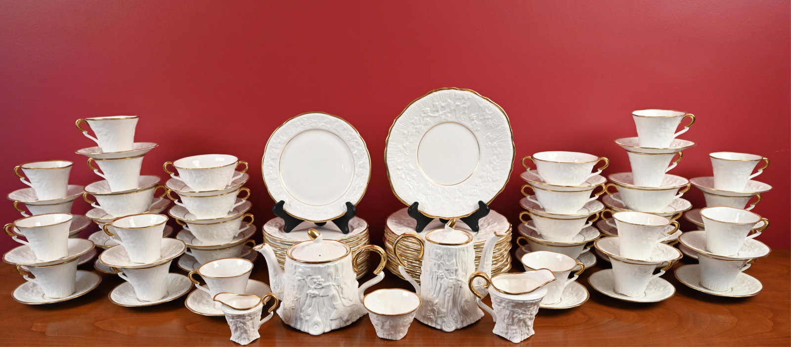 OLD ENGLISH OAK ROYAL STAFFORD BONE CHINA SERVICE: Marked underneath: Royal Stafford, England, "Old English Oak." Including (21) teacups, (33) 6" saucers, (14) 6.5" saucers, (17) 8.25" plates, (16) 10.5" plates, (14) soup bowls, one coffee pot, one te