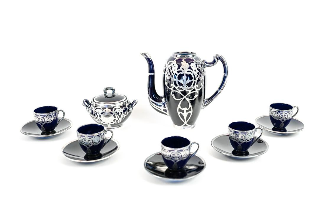LENOX SILVER OVERLAID DEMI-TASSE SERVICE: Marked underneath. Including sugar, teapot, (6) demi-tasse cups, and (5) saucers. Dimensions: (Teapot) H 7" x W 8" x D 4.5" Condition: As is, most with old breaks and repairs. Teapot lacking lid. Tarn