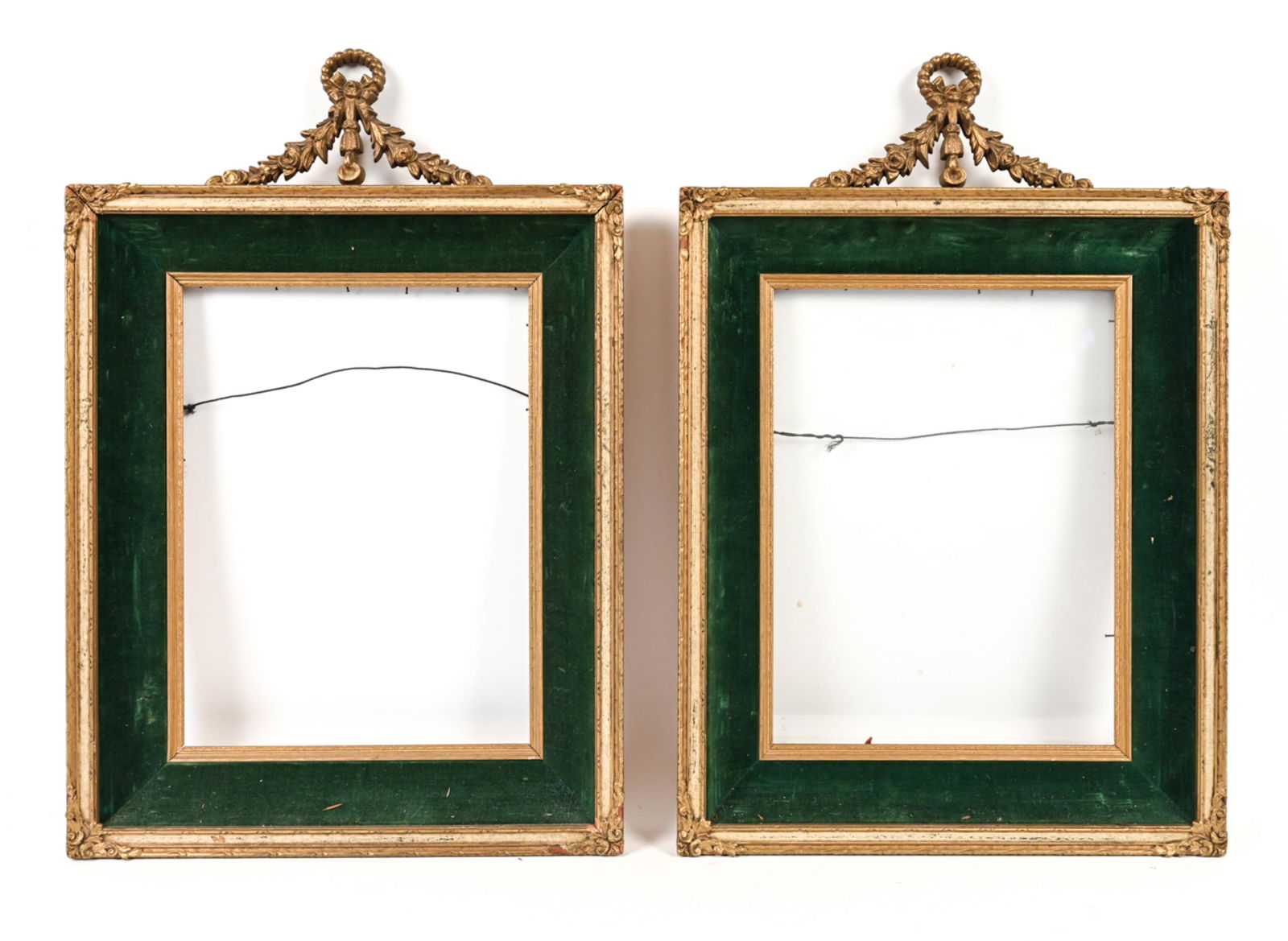 ANTIQUE FAUX GILT & GREEN VELVET PICTURE FRAMES: Faux gilt and carved frames with green velvet frame lining. Dimensions: H 21" x W 14.25" Condition: One lacking glass. Small losses and wear to frames. Discoloration to velvet.
