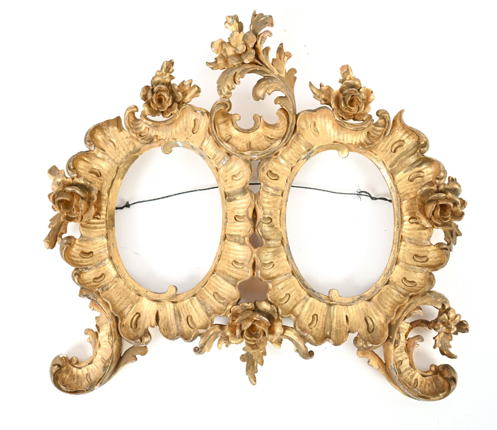 ROCOCO STYLE DOUBLE PICTURE FRAME: Ornate frame with rose motif. Dimensions: H 13.5" x W 13.75" x D 2" Condition: Few small chips to frame.