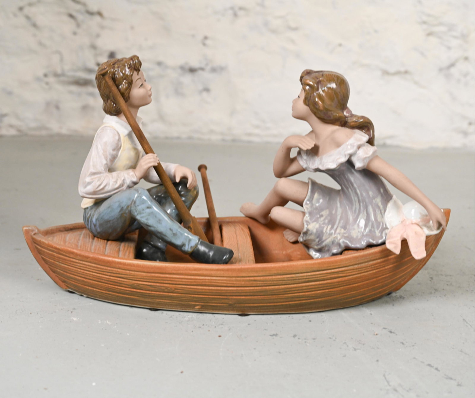 PORCELAIN TNGRA ROW BOAT: Marked on bottom "Tngra made in Spain" and signed on back "J.ten". Dimensions: H 13" x W 23" x D 10" Condition: Wear consistent with age and use, including some age wear.