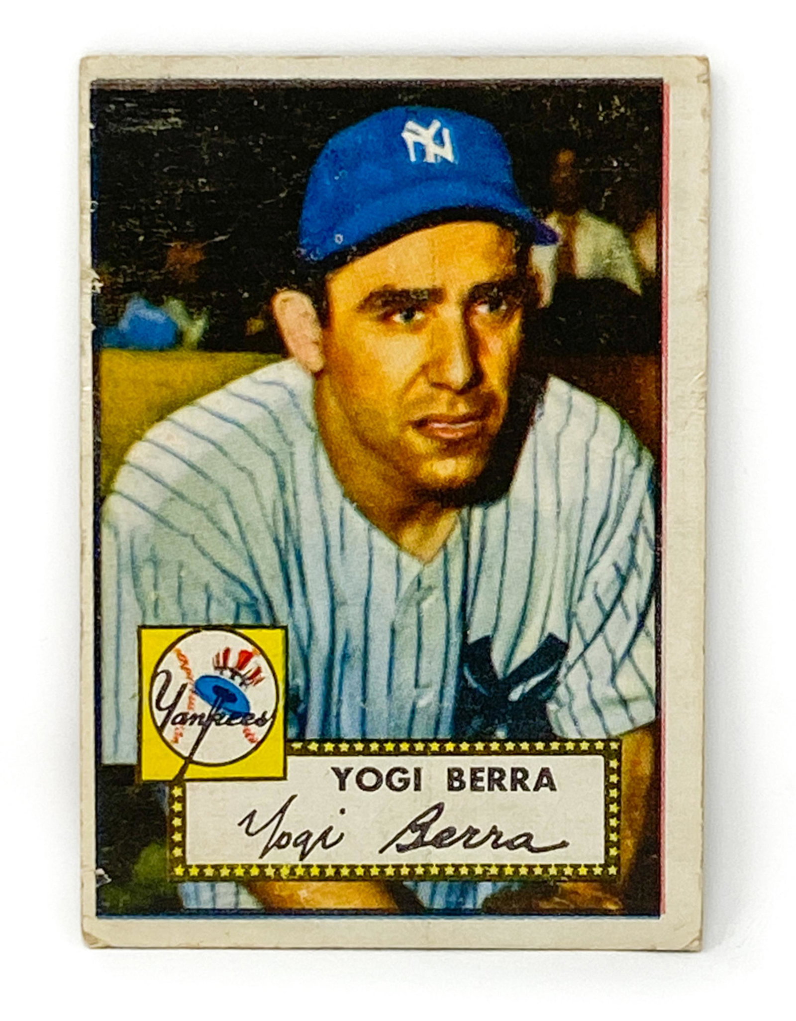 1952 TOPPS YOGI BERRA #191: Dimensions: (Card) H 3.75" x W 2.75" Condition: Rounding to corners. Scuffs to face of card. In plastic sleeve. Estimated Grade: VG 2