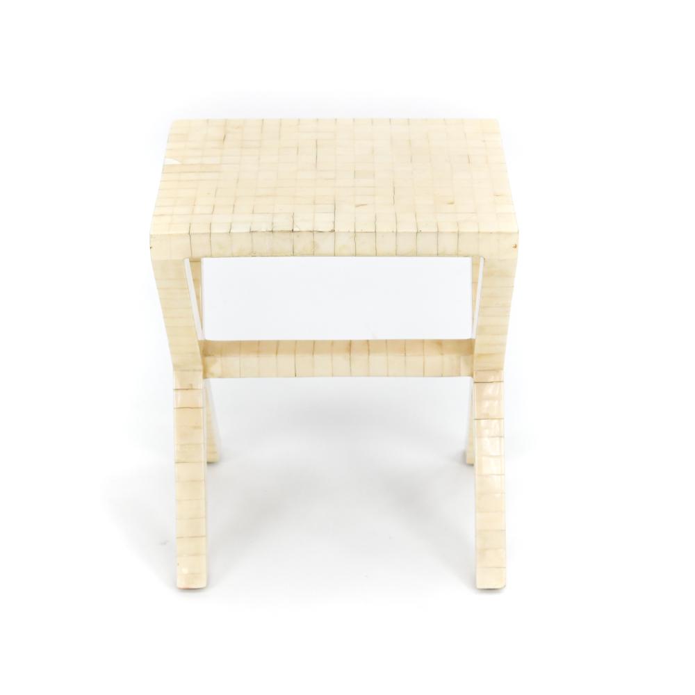 1970'S ENRIQUE GARCEL TESSELLATED BONE SIDE TABLE: Small X-base accent or side table, fully clad in a lacquered tessellated bone mosaic. With Enrique Garcel Hand Made in Colombia label underneath. Dimensions: H 17.25" x W 14" x D 11" Condition: Varnis