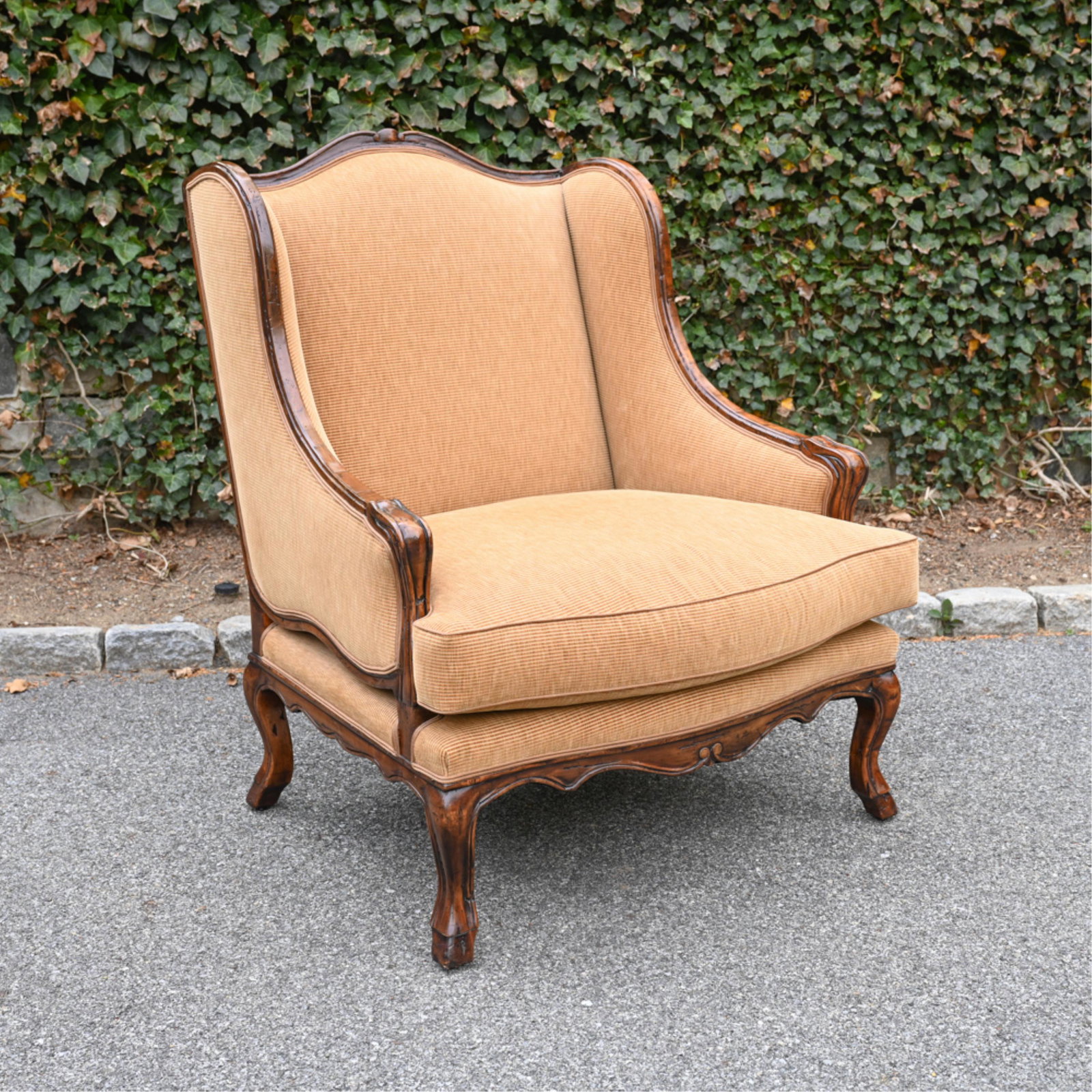 OVERSIZE FRENCH STYLE BERGERE LOUNGE CHAIR: Label underneath cushion: Furniture Masters. Contemporary. Dimensions: H 45.75" x W 37.5" x D 34.5" x SH 20.5" Condition: Faux worming and faux antiqued wear to wood.