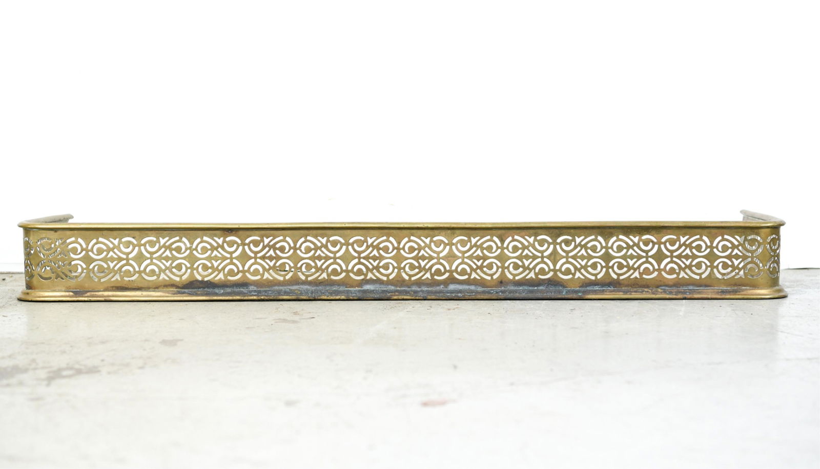 PIERCED BRASS FIRE FENDER (1 of 4)