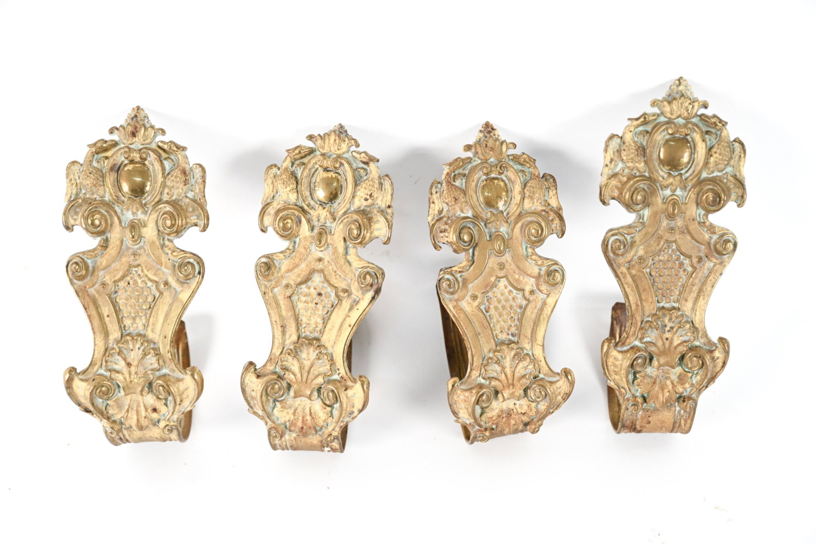 (4) ORMOLU CURTAIN TIE BACKS: Dimensions: H 8.5" x W 3.5" x D 4.5" Condition: Some tarnish.