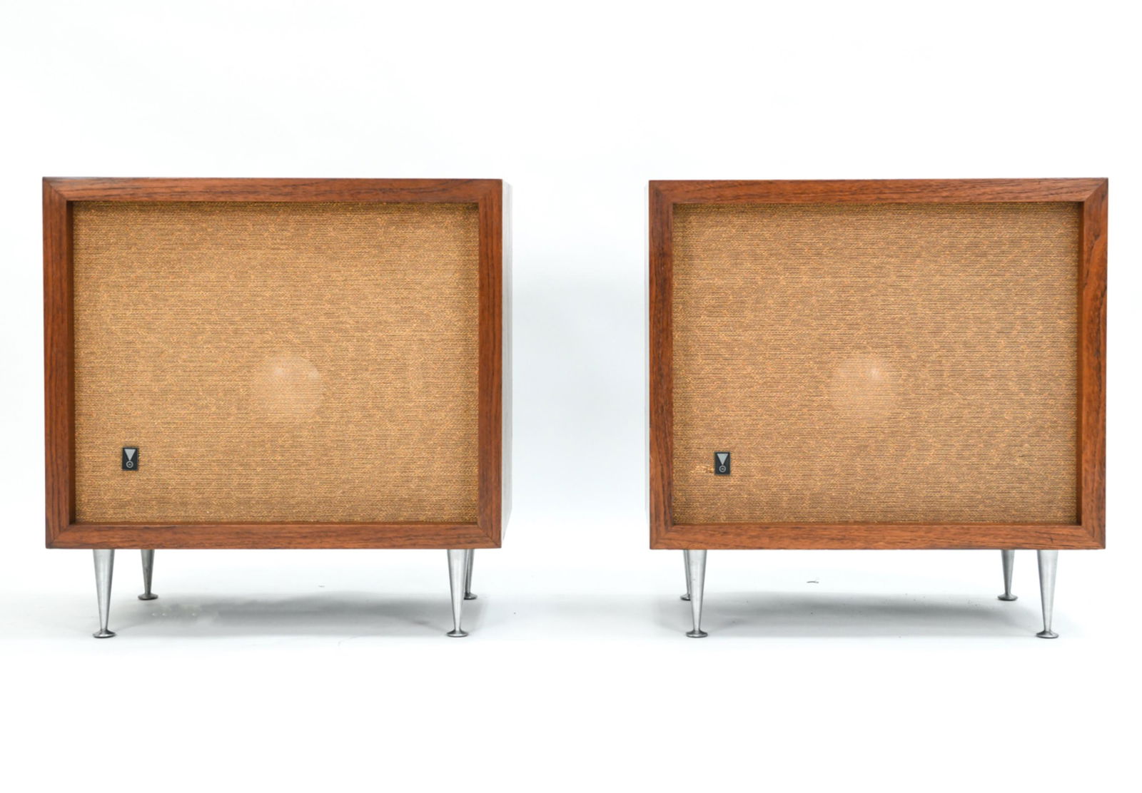 ALVIN LUSTIG DESIGNED WALNUT JBL C-38 SPEAKERS: Pair JBL floor speakers designed by Alvin Lustig. Walnut cabinets with beautiful wood grain and four brushed aluminum Nelson style legs. Label on back reads: James B. Lansing Sound, Inc. Los Angeles,
