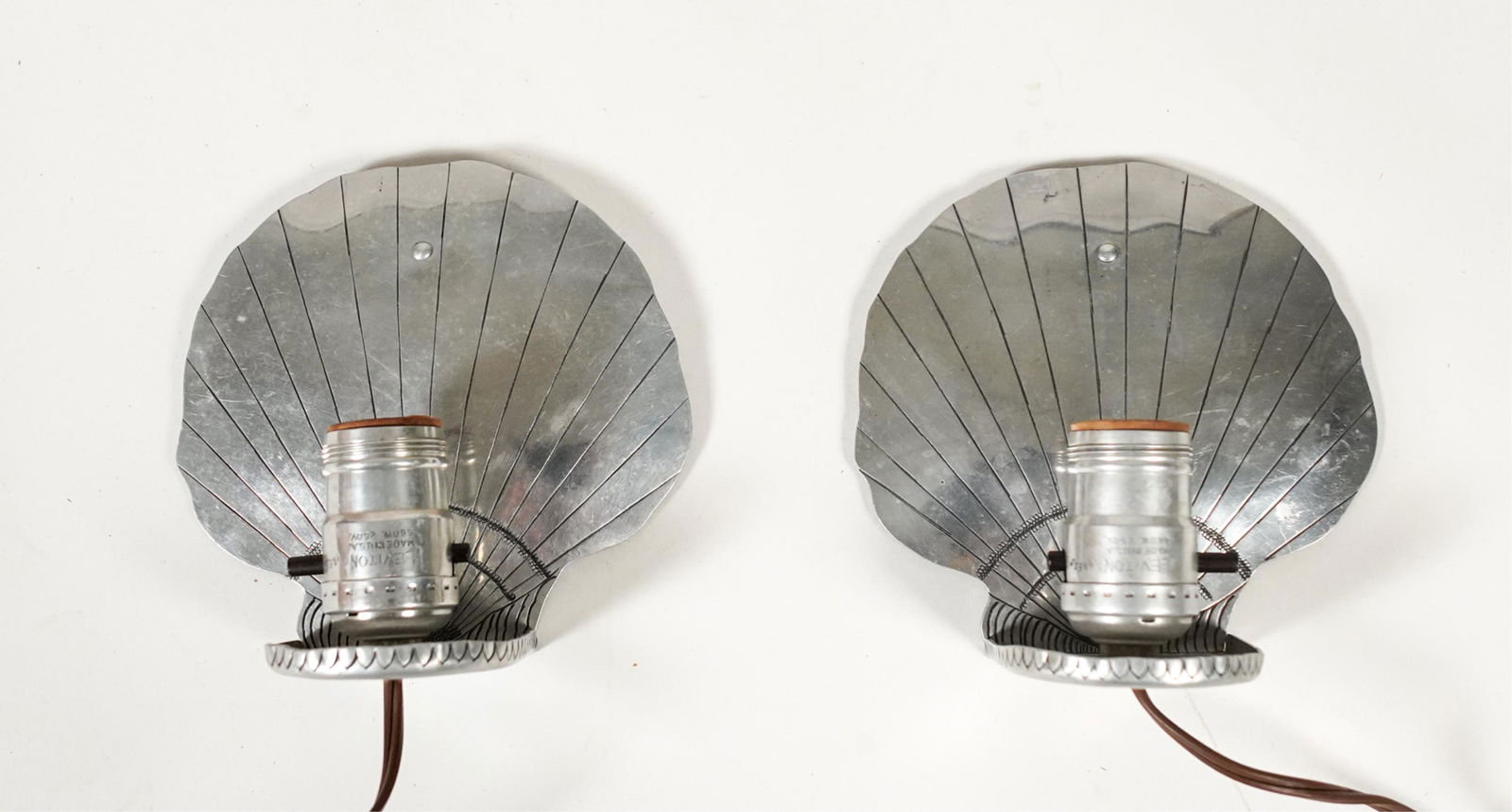 PAIR OF HANDMADE ALUMINUM SHELL FORM WALL SCONCES (1 of 6)