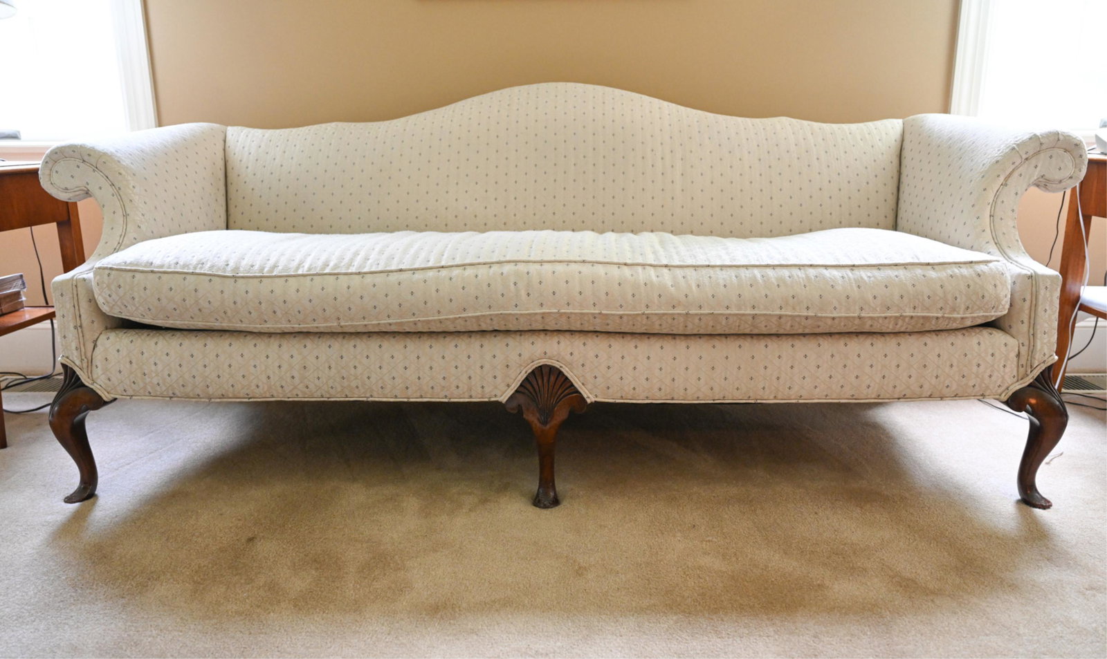 CHIPPENDALE STYLE SOFA: Cabriole legs, scrolled arms. Dimensions: H 33" x W 87" x D 31" x SH 18.5" Condition: Some surface wear to legs. Few small pulled threads to upholstery. Some soiling to upholstery.