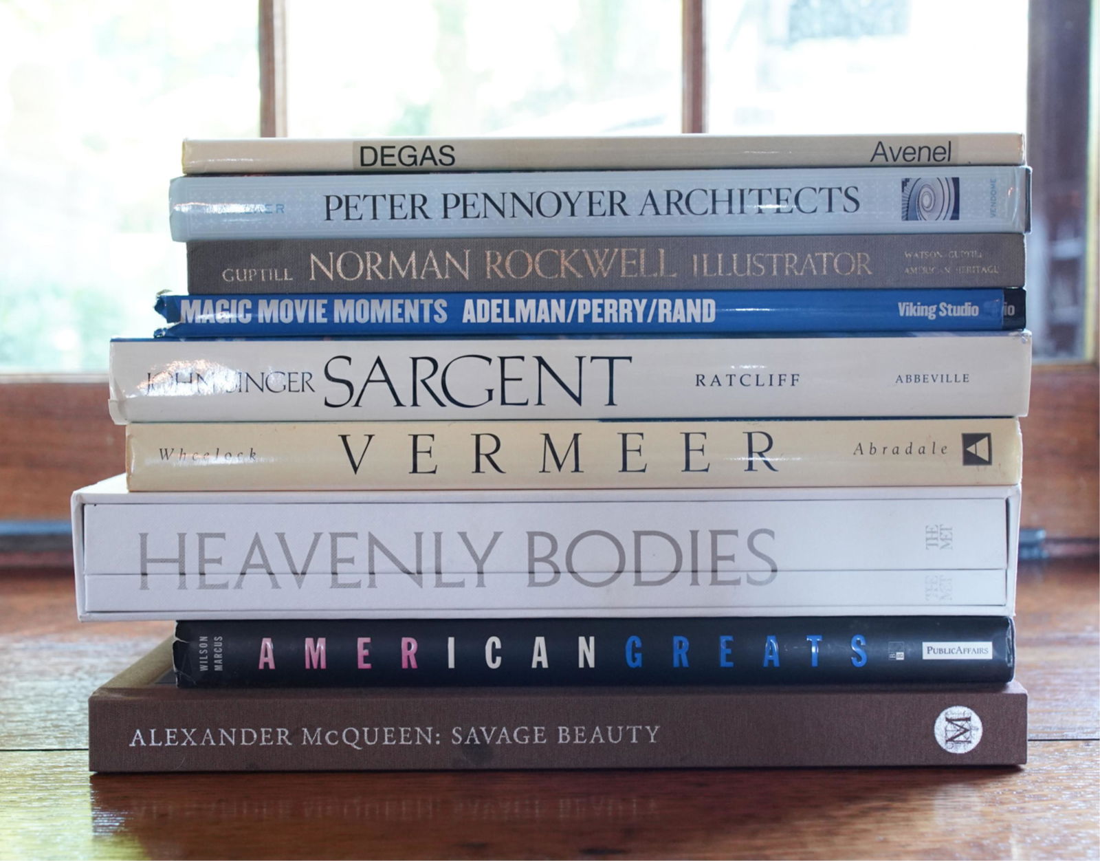 GROUPING OF ART & FASHION BOOKS: (9) books including Degas, Heavenly Bodies, Alexander McQueen: Savage Beauty, Vermeer, Sargent, etc. Dimensions: (Heavenly Bodies) H 13.75" x W 9.75" x D 2" Condition: Showing normal wear and tear con