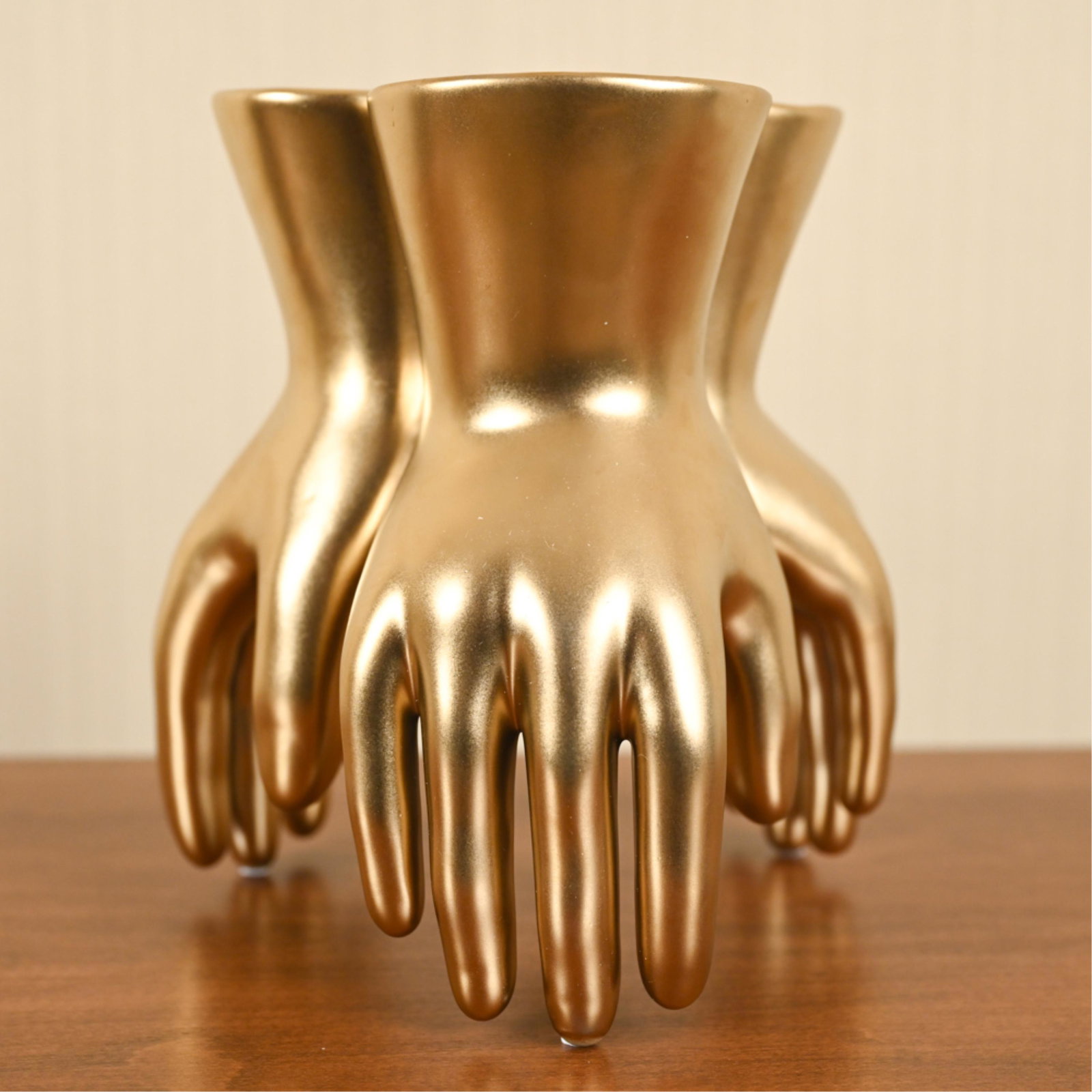 ARTERIORS PIEDMONT CERAMIC HANDS VASE: Dimensions: H 7" x W 6.5" x D 6" Condition: Showing light wear including minor rubbing to (3) fingertips.