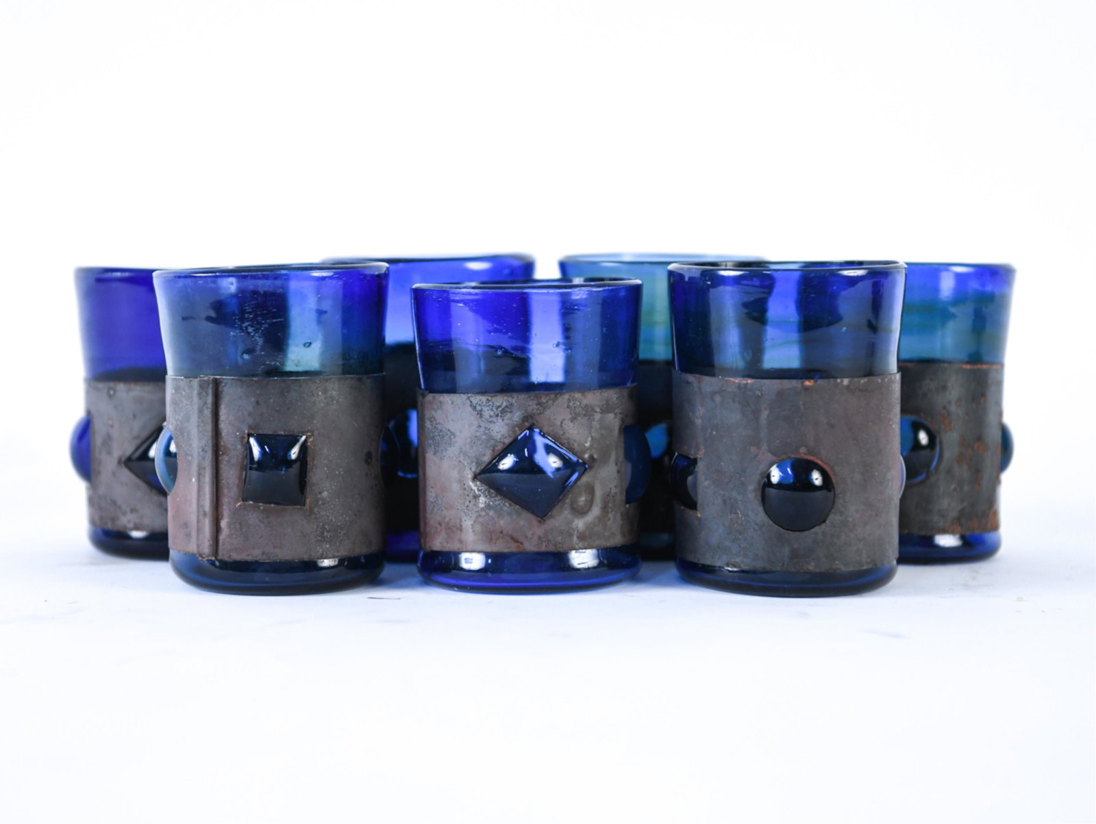 FELIPE DERFLINGHER IMPRISIONED GLASS GLASSES: Unmarked. Dimensions: H 4" x Dia. 3" Condition: Minor rusting to metal.