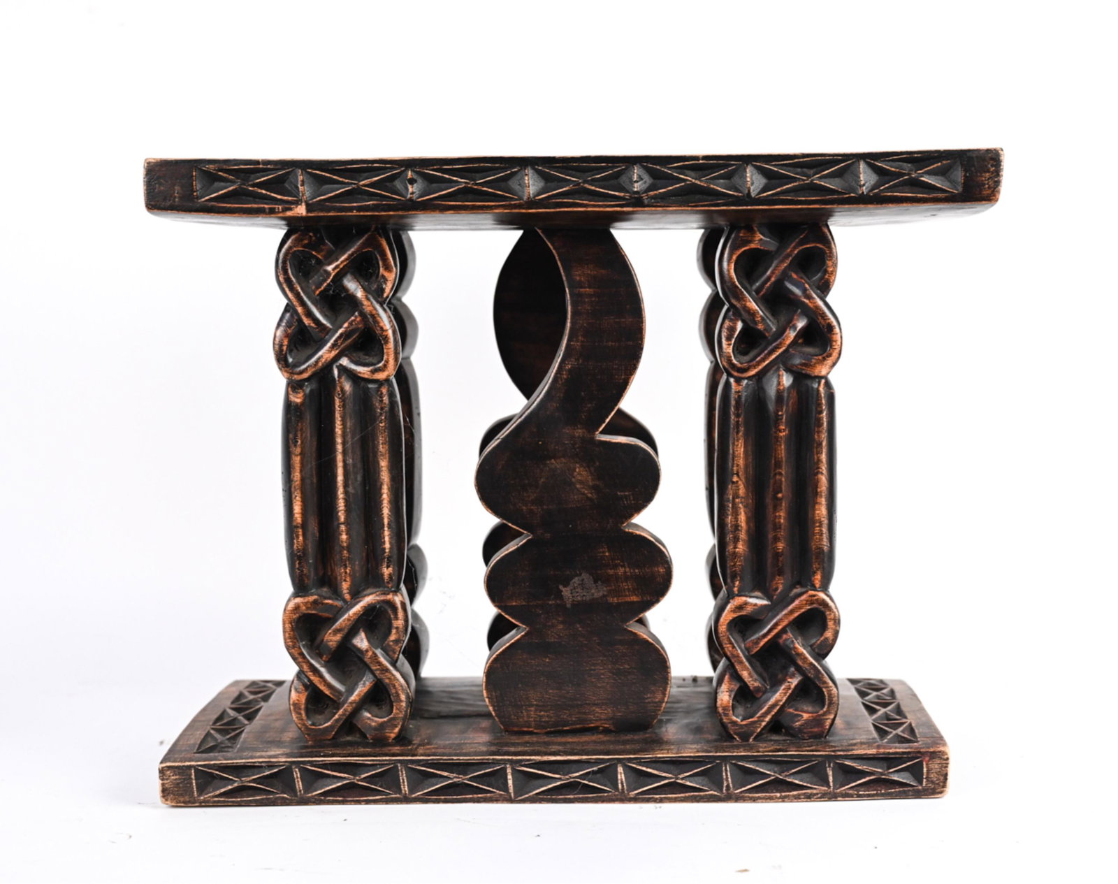 AFRICAN STYLE STOOL/SIDE TABLE: Carved and stained wood. Dimensions: H 16" x W 19.75" x D 10.5" Condition: Faux distressed.